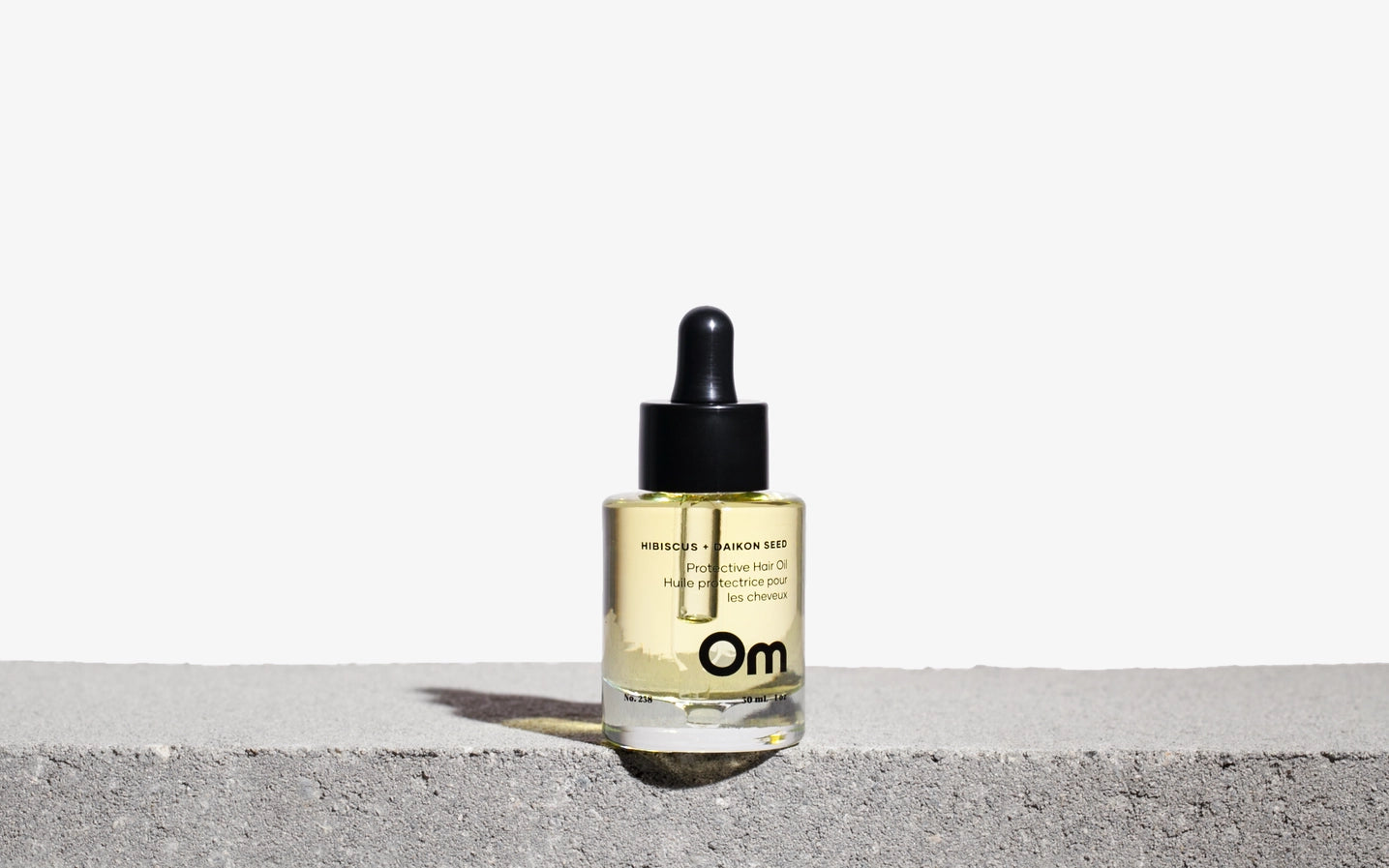 OM Huile capillaire protectrice aux graines d'hibiscus et de daikon - 30ml