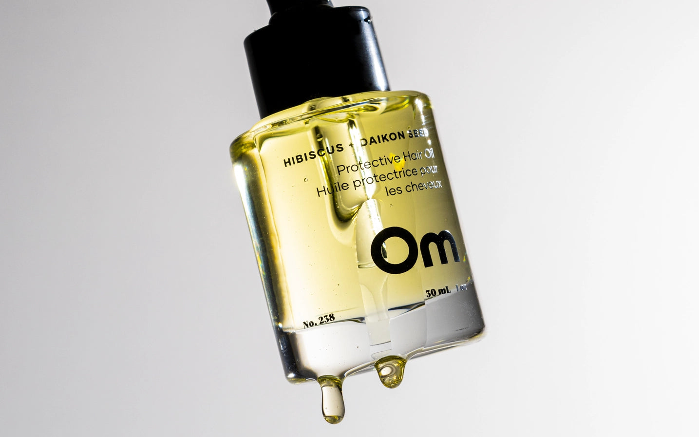 OM Huile capillaire protectrice aux graines d'hibiscus et de daikon - 30ml